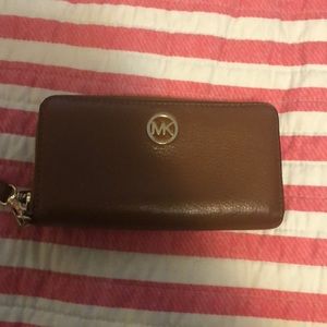 MK cell phone wristlet. Leather.